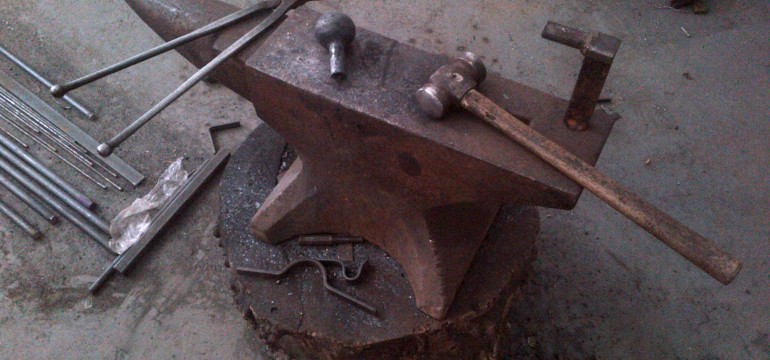Anvil, tools and a finial in the making