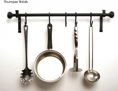 Iron pan rack with thumper finials