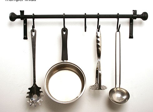Iron pan rack with thumper finials